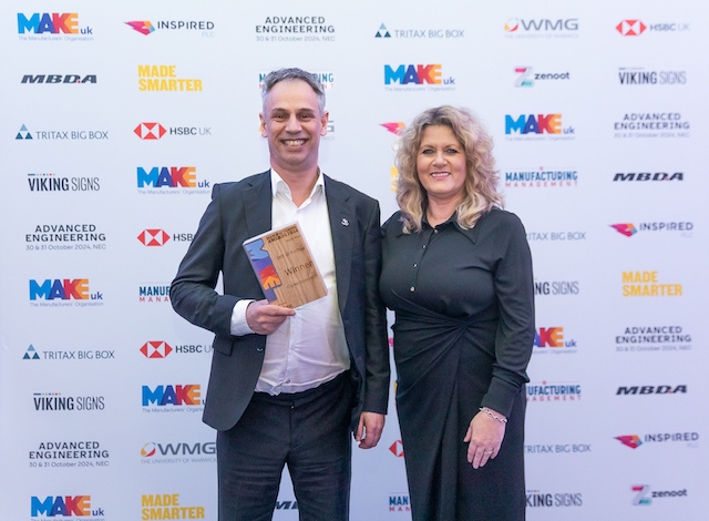 Richard Hagan from Crystal Doors being presented with his award by Dawn Huntrod 